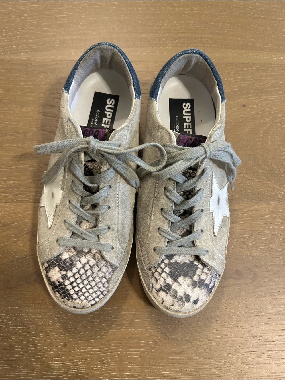 Golden Goose gray and white Star low-top sneakers with snakeskin detail